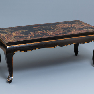 A Chinese rectangular lacquered wood table for the European market, 19th C.