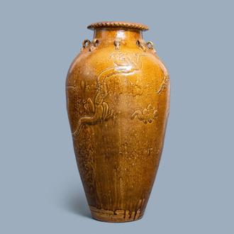 A large Chinese brown-glazed relief-molded martaban jar with dragons, Qing