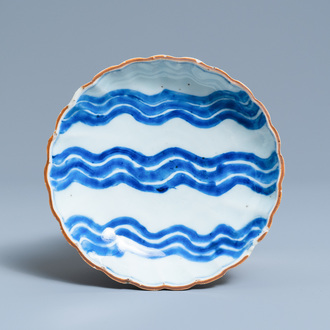 A Chinese blue and white ko-sometsuke 'wave' plate for the Japanese market, Chenghua mark, Tianqi