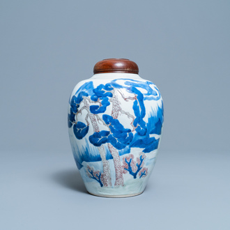 Een Chinese blauw-witte, koperrode en celadon vaas met landschapsdecor, Kangxi