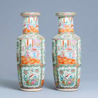 A pair of Chinese Canton famille rose rouleau vases, 19th C.