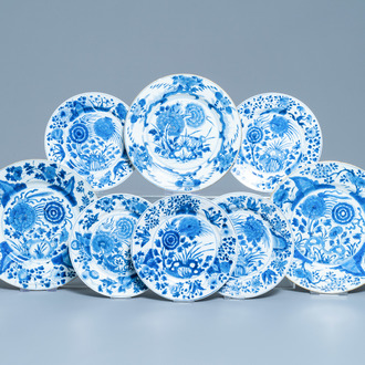 Eight Chinese blue and white plates with birds among blossoms, Kangxi