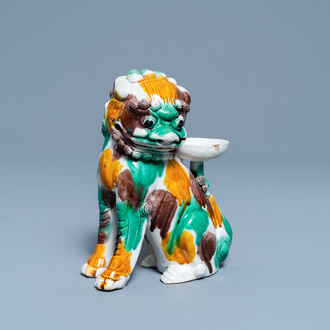 A Chinese sancai-glazed biscuit Buddhist lion joss stick holder, Kangxi