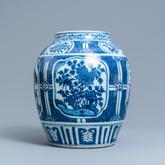 A Chinese blue and white vase with floral panels, Wanli