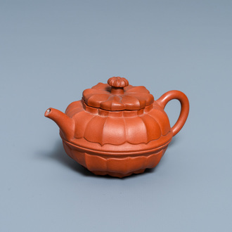 A Chinese Yixing stoneware chrysanthemum-shaped teapot and cover, Yongzheng/Qianlong