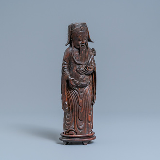 A Chinese bamboo wood figure of Lu Xing, 17th C.