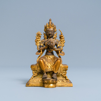 Une figure de Bouddha en bronze doré et incrusté, Chine, 18/19ème