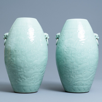 Een paar Chinese monochrome celadon vazen met onderglazuur decor, Qianlong merk, 19e eeuw