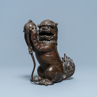 A Chinese lacquered bronze 'Buddhist lion' censer and cover, Ming