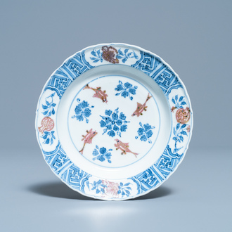 A Chinese blue, white and copper red 'fish' plate, Chenghua mark, Kangxi