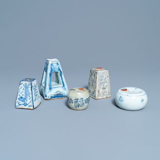 Five Chinese blue and white scroll weights, Ming/Qing