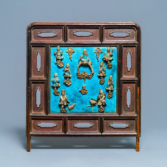 A Chinese square fahua 'Immortals' plaque mounted in a wooden table screen, Ming