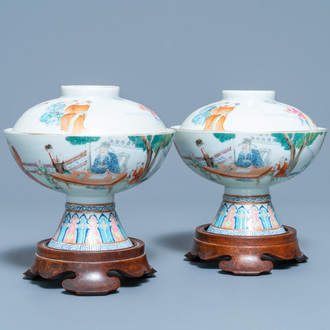 A pair of Chinese famille rose stem bowls and covers, Jiaqing mark and of the period