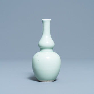 A Chinese monochrome celadon double gourd vase, Kangxi