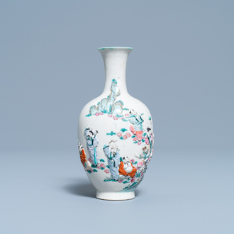 A Chinese famille rose relief-molded 'immortals' vase, Qianlong mark, 19th C.