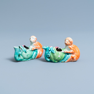 A pair of Chinese famille rose 'monkey and peach' water droppers, 19th C.