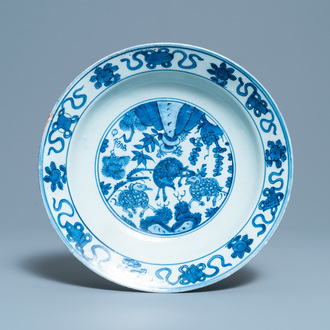 A Chinese blue and white 'three rams' dish, Jiajing