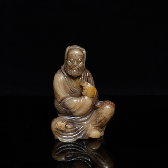 A Chinese Shoushan soapstone figure of a bearded elder, 18th C.