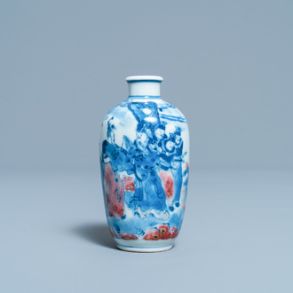 A small Chinese blue, white and copper-red vase, 19th C.