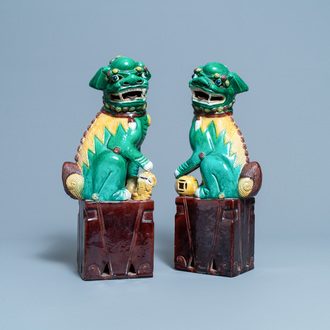 A pair of tall Chinese sancai-glazed biscuit models of Buddhist lions, 19/20th C.