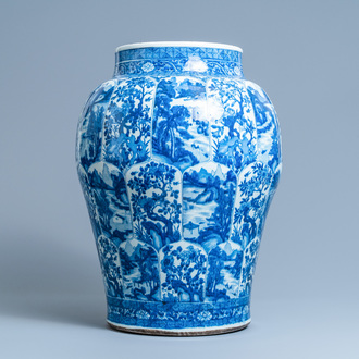 A massive Chinese blue and white vase with floral and landscape panels, Kangxi