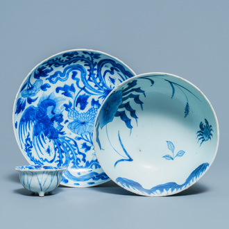 A Chinese blue and white 'phoenix' dish, a 'crab' bowl and a lotus-shaped bowl, Kangxi