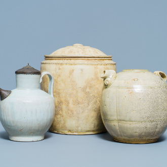 A Chinese celadon-glazed 'Jue' ewer, a qingbai-glazed wine ewer and a storage vessel, Song/Yuan