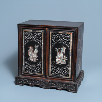 A Chinese or Vietnamese mother-of-pearl-inlaid wooden two-door cabinet, 19th C.