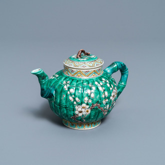 A Chinese verte biscuit teapot and cover, Kangxi