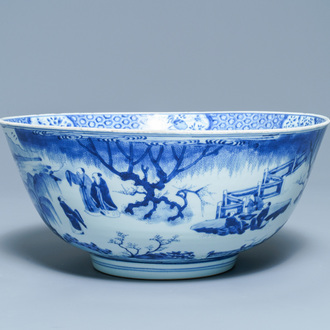 A large Chinese blue and white bowl with figures in a landscape, Kangxi