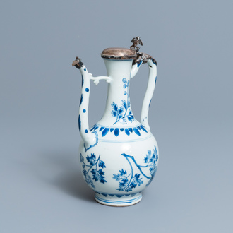 A Chinese blue and white silver-mounted ewer and cover, Transitional period