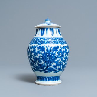 A Chinese blue and white 'lotus scroll' jar and cover, Transitional period