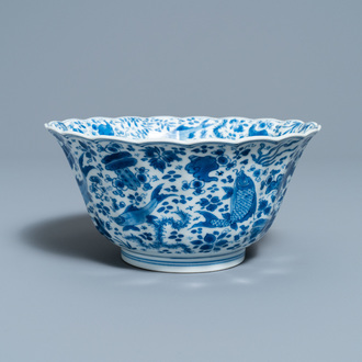 A Chinese blue and white lobed 'carps and crab' bowl, Kangxi