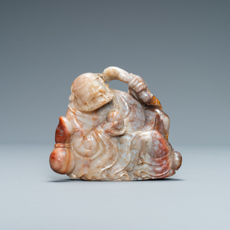 A Chinese carved 'Shoushan' soapstone figure of an immortal, Qing