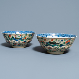 A pair of Chinese famille verte café-au-lait-ground lotus-molded bowls, Kangxi