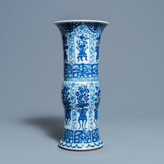 Een Chinese blauw-witte 'gu' vaas met jardinières, Kangxi