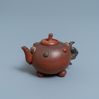 A Chinese Yixing stoneware teapot and cover with applied nuts, 19/20th C.