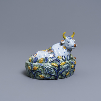 A polychrome Dutch Delft butter tub in the shape of a cow, 18th C.