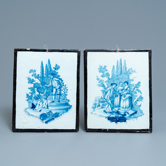 A pair of Dutch Delft blue and white plaques with black borders, 18th C.