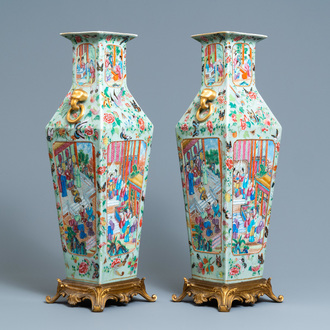 A pair of Chinese square famille rose celadon-ground vases on gilt bronze feet, 19th C.