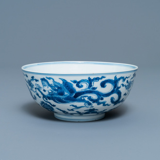 A Chinese blue and white 'dragon' bowl with a double vajra in the centre, Chenghua mark, Kangxi