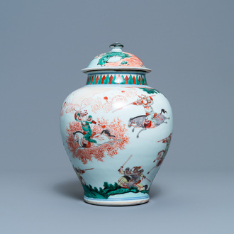 A Chinese famille verte vase and cover with an equestrian battle scene, Kangxi