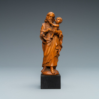 Une statue de Joseph à l'enfant en buis sculpté, Flandres, 17ème