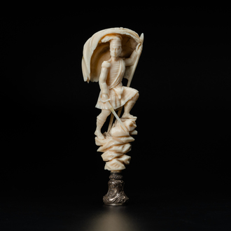 Un cachet en argent avec un hussard en ivoire formant manche, 19ème