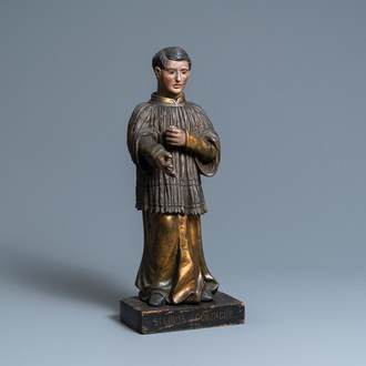 A polychromed and gilded wooden figure of Aloysius Gonzaga with glass eyes, Italy, 18th C.