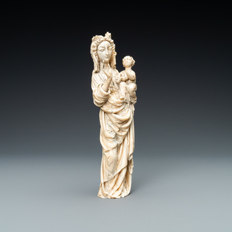 An ivory figure of a Madonna with child, probably France, 19th C.