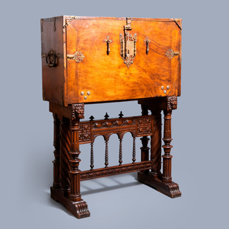 A Spanish bronze-mounted oak 'bargueño' or cabinet on stand, 16th C.