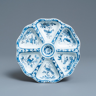 A lobed Dutch Delft blue and white spice dish with birds, late 17th C.