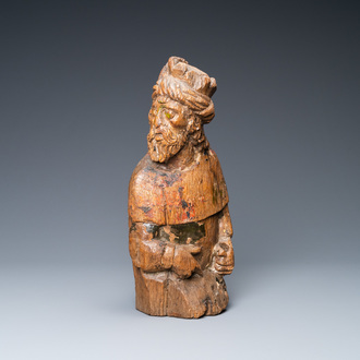 An oak figure of a prophet with traces of polychromy, 16th C.