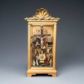 A polychromed wooden 'Golgotha' group with all the Instruments of the Passion in glass display, France or Italy, 18th C.